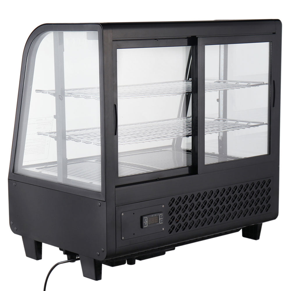 Marchia MDC100 27" Black Countertop Refrigerated Bakery Display Case with curved glass and LED lighting. Features a compact design for showcasing and keeping baked goods cool and illuminated.