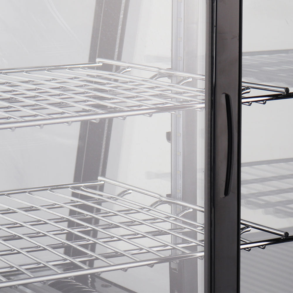 Marchia MDC100 27" Black Countertop Refrigerated Bakery Display Case with curved glass and LED lighting. Features a compact design for showcasing and keeping baked goods cool and illuminated.