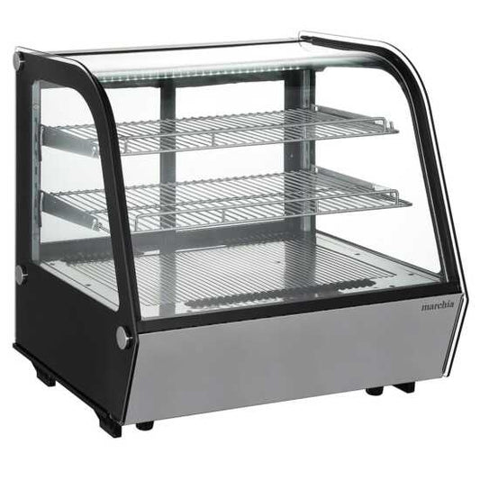 Marchia MDC121 28" Countertop Refrigerated Bakery Display Case with curved glass and LED lighting. Features a compact design for elegantly showcasing and keeping baked goods cool and illuminated.
