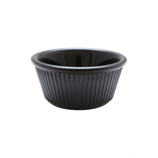 Thunder Group Fluted Ramekin 12/Pcs is a small ceramic-like bowl that will be perfect for serving various dishes. Made from durable melamine such ramekin can withstand long-time use and is effortless in maintenance. Due to its stain-proof abilities, you can serve different acidic sauces, and it would not change its vibrant black color. It is also scratch-resistant with smooth on the inside easy-to-clean surface. 