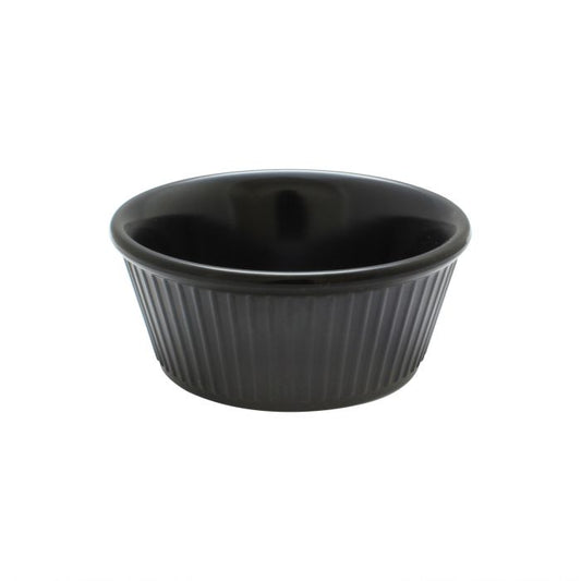 Thunder Group Fluted Ramekin 12/Pcs is a small ceramic-like bowl that will be perfect for serving various dishes. Made from durable melamine such ramekin can withstand long-time use and is effortless in maintenance. Due to its stain-proof abilities, you can serve different acidic sauces, and it would not change its vibrant black color. It is also scratch-resistant with smooth on the inside easy-to-clean surface. 