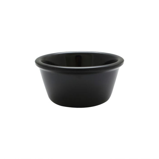 Thunder Group Smooth Ramekin 12/Pcs is a small ceramic-like bowl that will be perfect for serving various dishes. Such flat 3 Oz ramekin can be used for serving individual portions of sauces, dips, ice cream, side garnishes, and condiments. Made from durable scratch-resistant melamine this heavy duty 3 1/8-inch black ramekin has a thick solid structure that can withstand long-time use and is effortless in maintenance. 