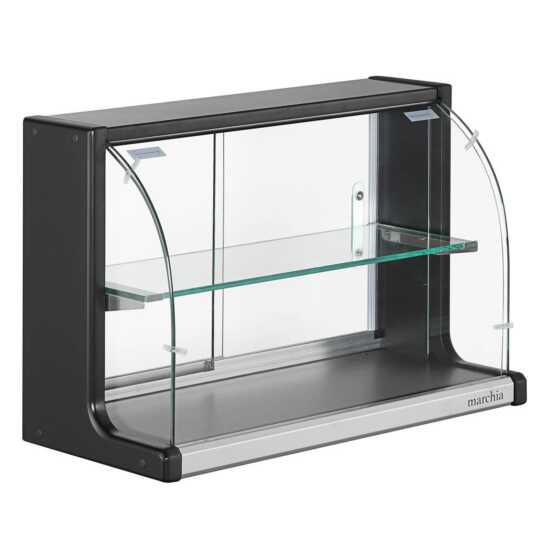 The Marchia USTAR-T25 26" dry curved glass bakery display case features a sleek, non-refrigerated design with a spacious interior for showcasing baked goods, a curved glass front for optimal visibility, and elegant black trim.