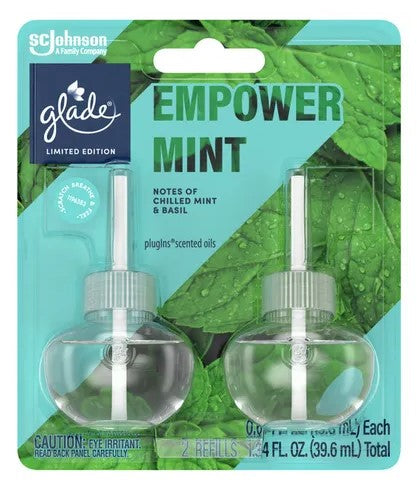 Two Glade Empower Mint scented oil refills, 0.67 oz each, for plug-in warmers, with a refreshing mint fragrance.