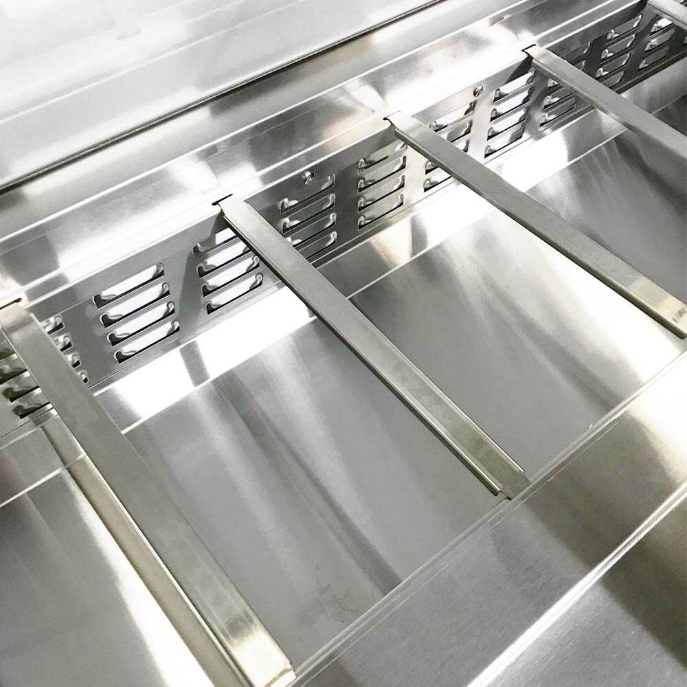 Coldline SMP48 48-inch mega top refrigerated sandwich prep table with cutting board and food pans. Perfect for storing ingredients, keeping them fresh, and efficiently preparing sandwiches in busy kitchens.