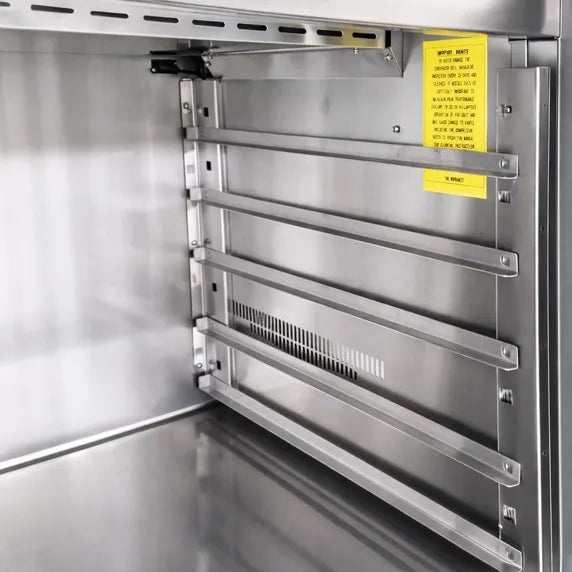 Coldline PDR-80W 80-inch two-door refrigerated pizza prep dough retarder with marble top, designed for pizzerias to keep dough chilled and provide a durable workspace for efficient pizza preparation.