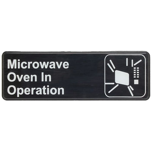 Thunder Group Information Sign with Symbol prevents accidental burns by placing this sign near kitchen areas. Designed with a graphic symbol and bold white lettering, this information sign clearly informs customers that a microwave oven is in operation. This is also important for people with pacemaker implants as the microwave can cause interference with the pacemaker's operation. For added convenience, this information sign has a self-adhesive back for easy mounting.