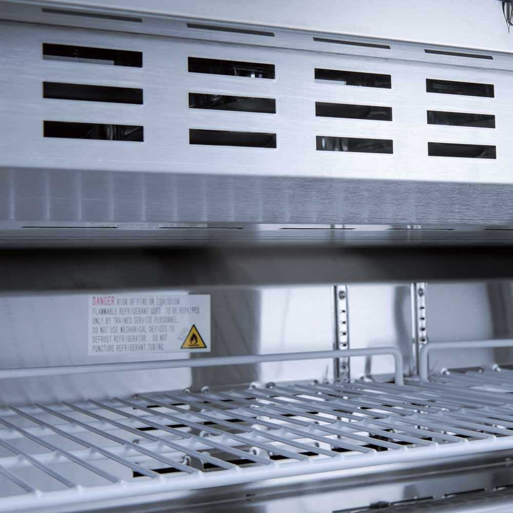 Coldline SMP48 48-inch mega top refrigerated sandwich prep table with cutting board and food pans. Perfect for storing ingredients, keeping them fresh, and efficiently preparing sandwiches in busy kitchens.