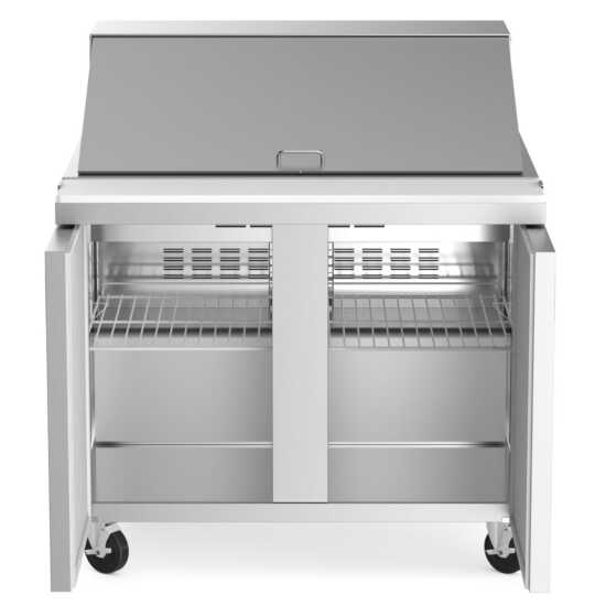 Coldline SMP36 36-inch mega top refrigerated sandwich prep table with cutting board and food pans. Ideal for restaurants to store fresh ingredients and prepare sandwiches with convenience and efficiency.