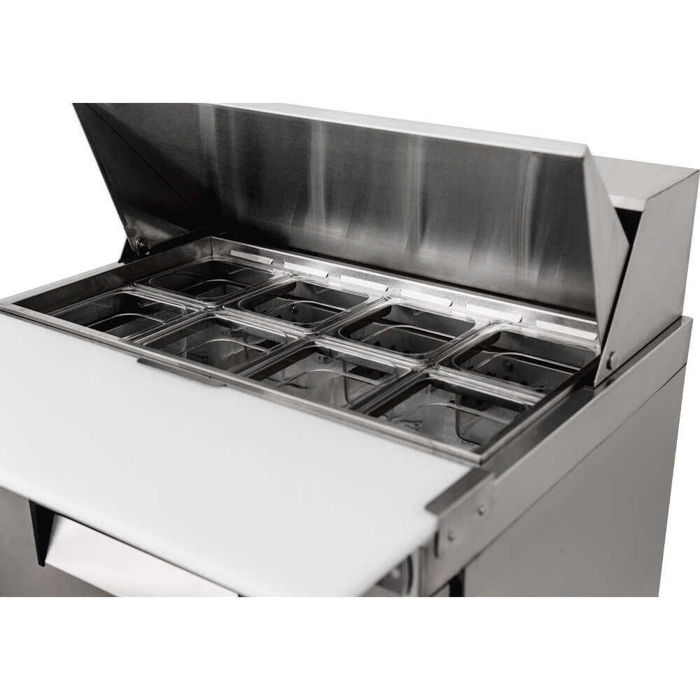 Coldline SPN-29 29" Narrow Depth Refrigerated Sandwich Prep Table with a space-saving design, durable stainless steel construction, cutting board, food pans, and energy-efficient cooling. Perfect for compact commercial kitchens needing efficient food prep and storage.