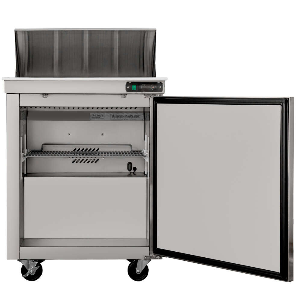 Coldline SPN-29 29" Narrow Depth Refrigerated Sandwich Prep Table with a space-saving design, durable stainless steel construction, cutting board, food pans, and energy-efficient cooling. Perfect for compact commercial kitchens needing efficient food prep and storage.