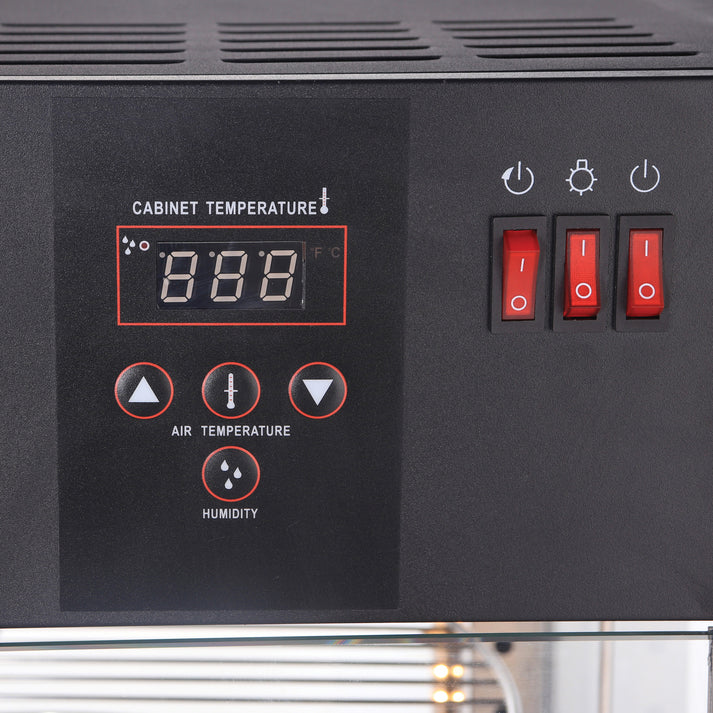 Electric Display Merchandiser 1/Pack holds (4) 18” pizza pans. The racks rotate to ensure even heating. A temperature control knob allows for precise adjustments for a temperature range of 89°F to 194°F. The pizza warmer has a black powder-coated exterior and stainless steel interior. Clear view tempered glass on all sides ensure an appetizing appearance from any angle. A rear door quickly opens and closes minimizing temperature fluctuations. LED lights illuminate the interior ensuring high visibility.