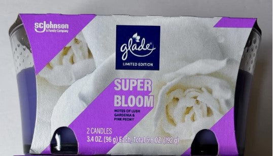 Two Glade Super Bloom scented candles in glass jars, 3.4 oz each, with a fresh, vibrant floral fragrance.