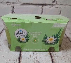 Glade Candle Bamboo & Waterlily twin pack, 3.4 oz each, with a fresh, uplifting fragrance for a relaxing home atmosphere.
