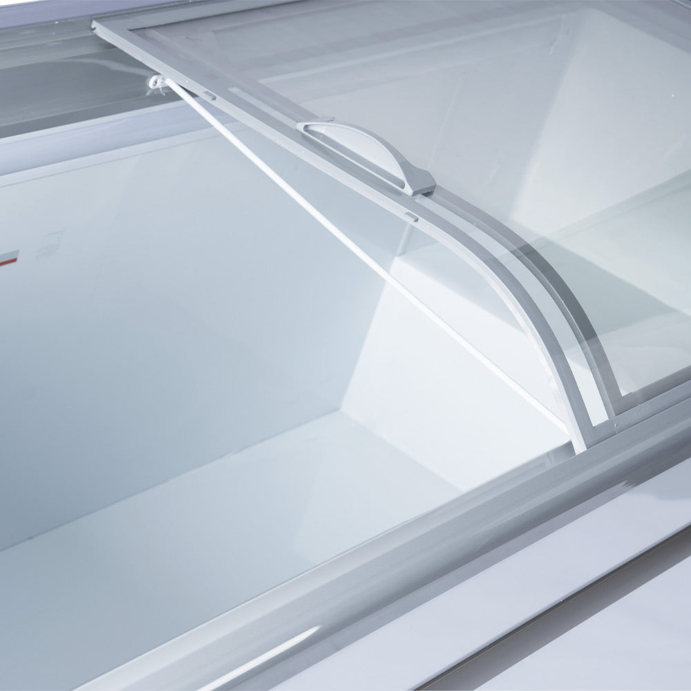 Commercial curved glass ice cream display freezer used for showcasing gelato and frozen desserts with bright LED lighting ideal for shops cafes and convenience stores needing large visible cold storage.