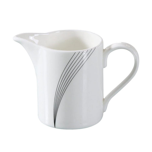 Yanco Creamer UR-PC offers a refined and practical way to serve cream with coffee or tea. Made from high-quality porcelain with a smooth glazed finish, it ensures durability while maintaining an elegant look. Its 6.5-ounce capacity is perfect for fine-dining restaurants, cafeterias, and catering events. Designed for convenience, this creamer is dishwasher, oven, and microwave safe, making it a reliable choice for both personal and commercial use.