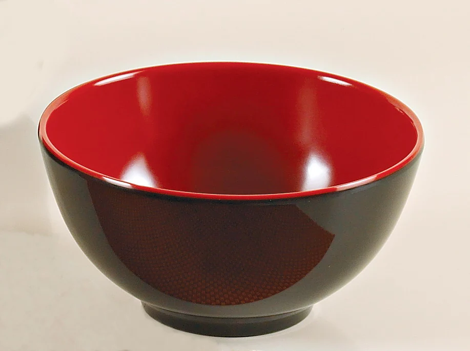 Yanco Nanjing Bowl CR-3004 the perfect addition to any dining set! This bowl is made from durable melamine and can hold up to 8 ounces of your favorite soup, cereal or snack. With a sleek black exterior and vibrant red interior, this bowl is sure to add a pop of color and style to your table setting. Measuring 4-1/2 inches in diameter and 2 inches in height, this round bowl is the ideal size for individual servings. And with its dishwasher-safe design, cleanup is a breeze.
