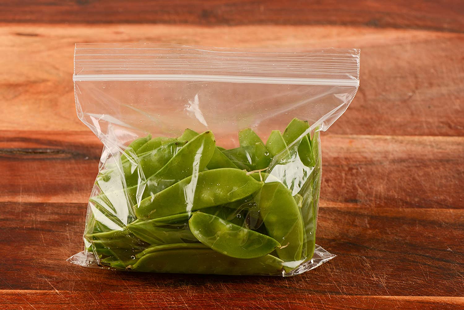 Disposable 7" x 5" Resealable Grip'n Zip Plastic Sandwich Bags, Clear Kosher Zip Lock Lunch Bags leak proof secure seal affordable bulk economical commercial wholesale houselhold mealprep school lunch arts and craft organization snack nut bag 